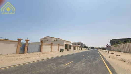 Plot for Sale in Al Salamah, Umm Al Quwain - For sale residential land with an area of 11,200 feet in Umm Al Quwain - As Salamah