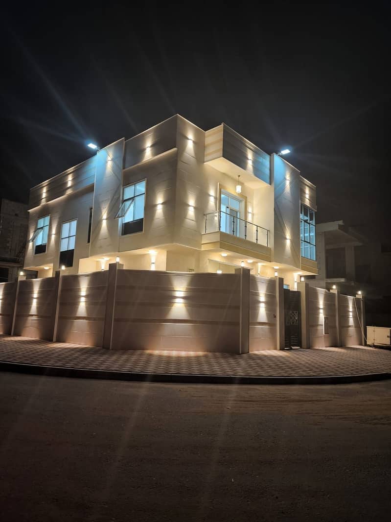 BRAND NEW VILLA LOCATED ON ROAD AVAILBLE FOR RENT 5 BEDROOMS WITH MAJLIS HALL IN AL YASMEEN IN 85,000/- AED YEARLY