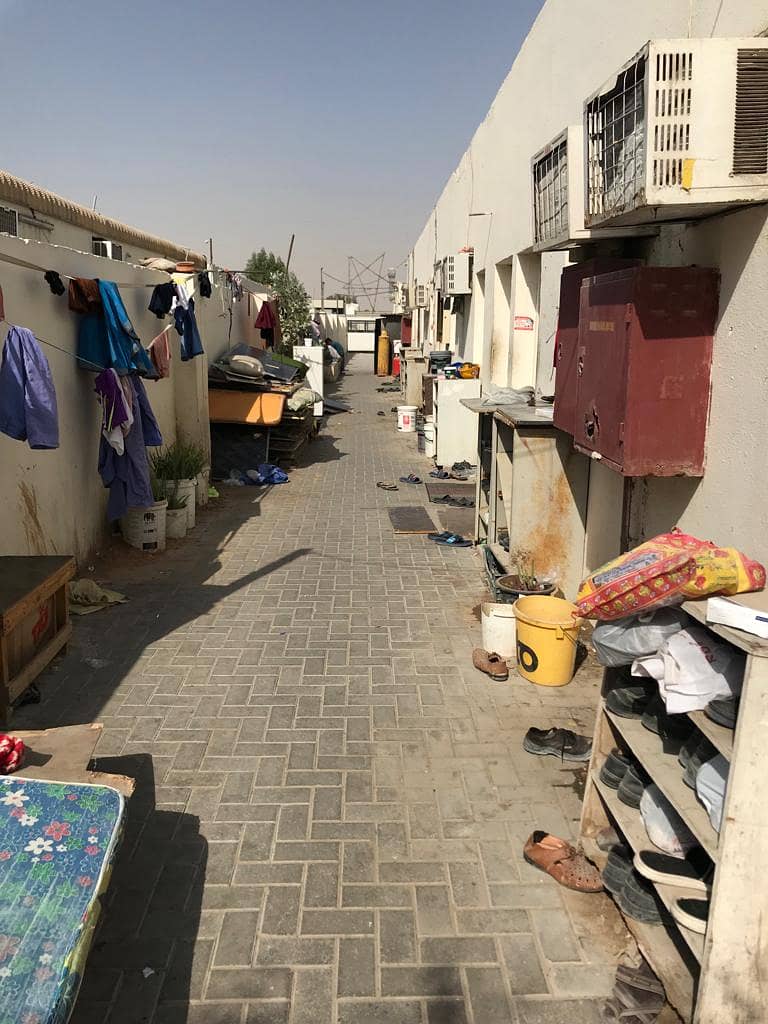 Labor housing for sale 32 rooms rented with an income of 120,000 AED