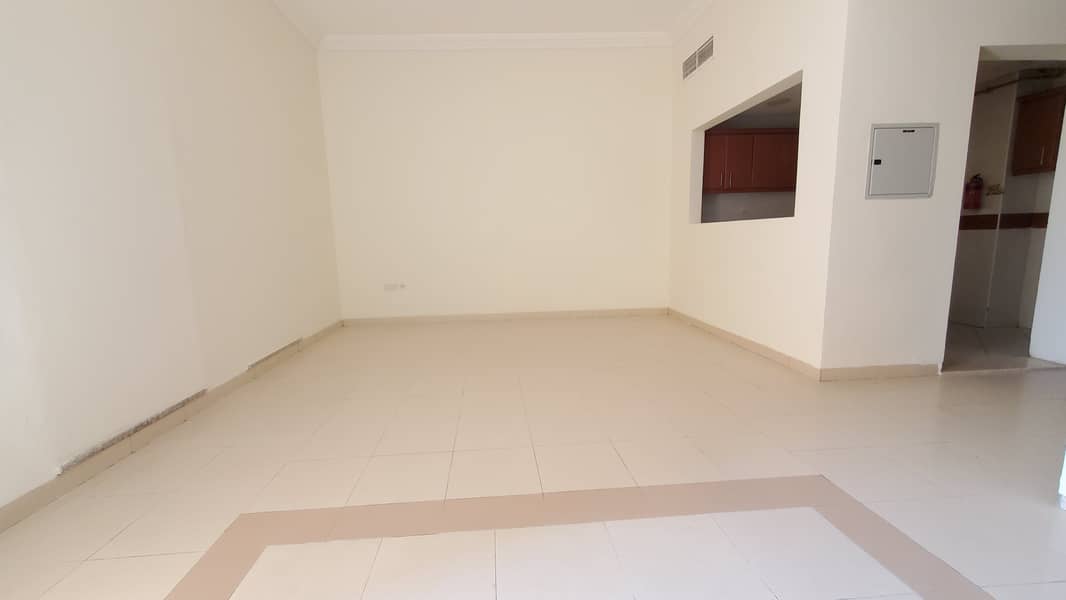 King Size Spacious Studio available with sami open kitchen for rent 28k in al warsan 4