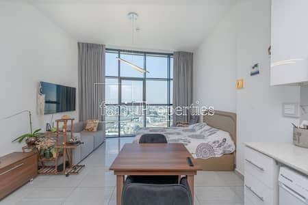 Studio for Sale in Jumeirah Village Circle (JVC), Dubai - High floor l Fully furnished l Skyline view