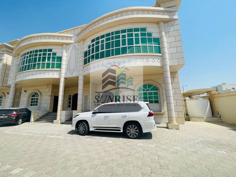 Deluxe villa in Mohammed bin Zayed City, consisting of 4 rooms, master, men\'s council, maid rooms, wardrobes with the wa