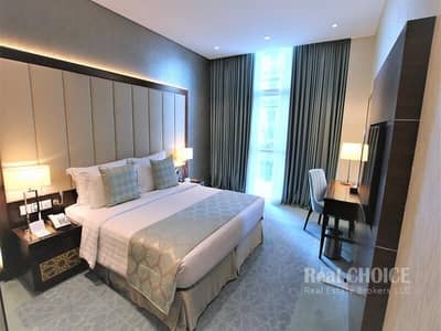 شقة فندقية 2 غرفة نوم للايجار في الخليج التجاري، دبي - شقة فندقية في رويال كونتيننتال للاجنحة الفندقية الخليج التجاري 2 غرف 150000 درهم - 6455015