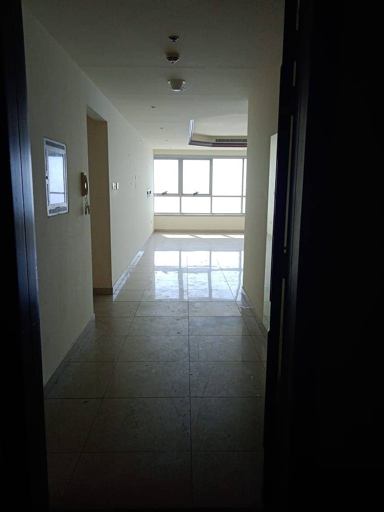 Chiller Free Spacious 2 BHK Close Kitchen Balcony Parking for Rent in Corniche Towers Ajman