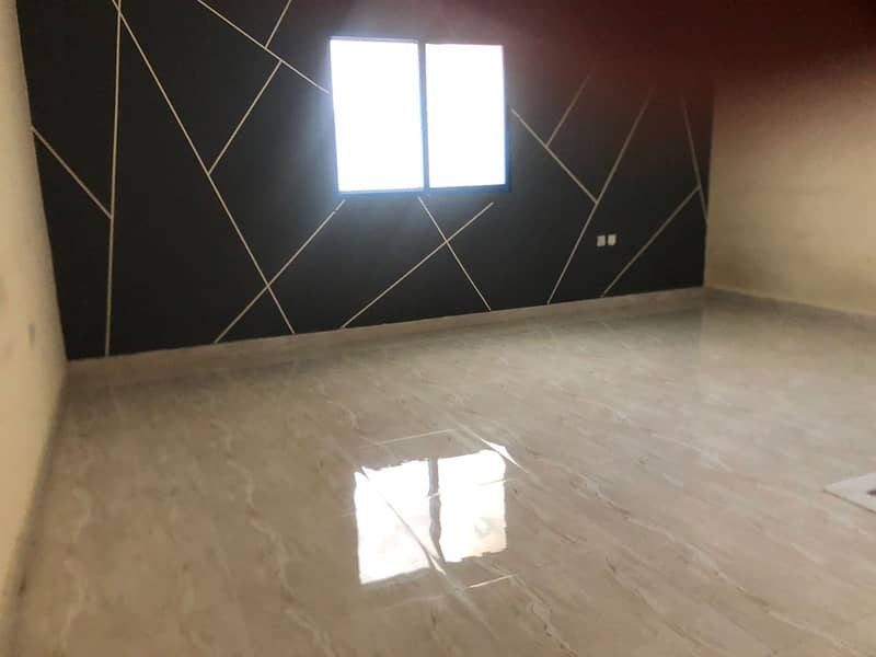 Two rooms and a hall for annual rent in Ajman Industrial 1