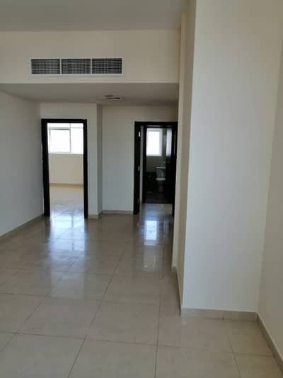 2 Bedroom Apartment for Rent in Al Rashidiya, Ajman - Two rooms and a large hall with a balcony