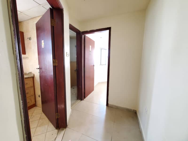 Hurry up limited time offers spacious Studio like 1bhk just 12k with full close kitchen+door also hall with door close to Dubai exit in Muwaileh Sharj