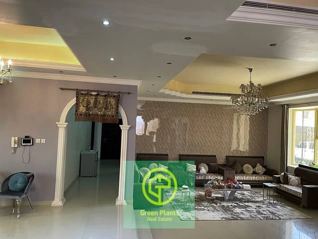 Al Mizhar 4 bedroom villa with spacious living & dining area.