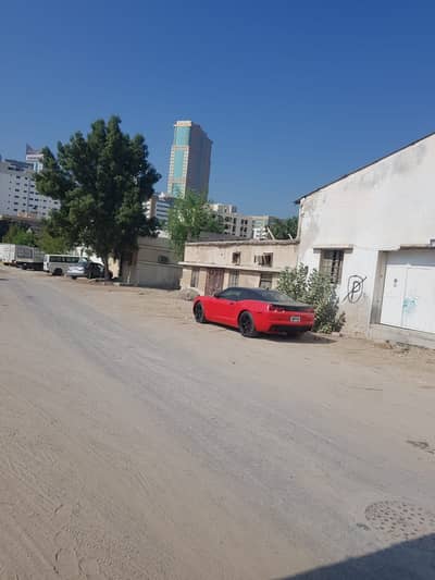 Plot for Sale in Industrial Area, Sharjah - Urgent for sale land in the first industrial zone (Al-Nahda). Angle at a very special price