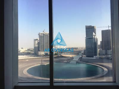 1 Bedroom Flat for Rent in Dubai Sports City, Dubai - Closed Kitchen | Stadium View | Canal View From the Bedroom |Well Maintained