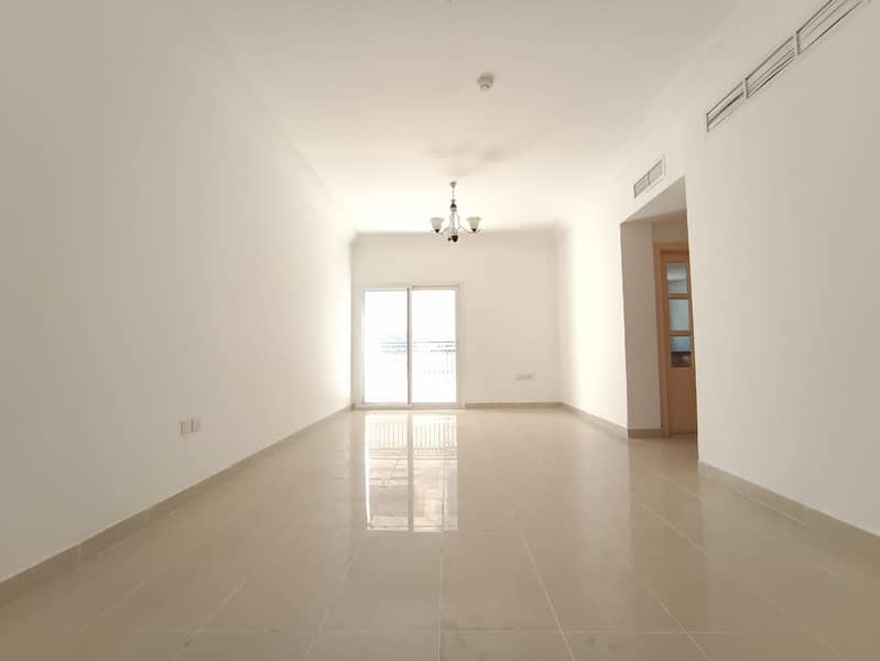 Spacious 2BHK (45 Days Free) rent 30k to Open hall with balcony family bulding Al Nahda sharjah