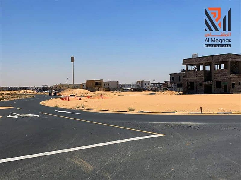 Land for sale in installments plan  in Al Zahia Gardens - Ajman- Free ownership for all nationalities