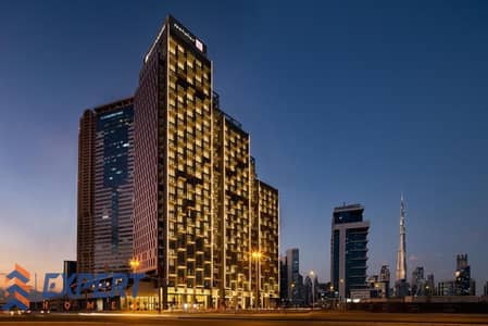 فلیٹ 1 غرفة نوم للايجار في الخليج التجاري، دبي - شقة في ميلينيوم اتريا الخليج التجاري 1 غرف 110000 درهم - 6459509