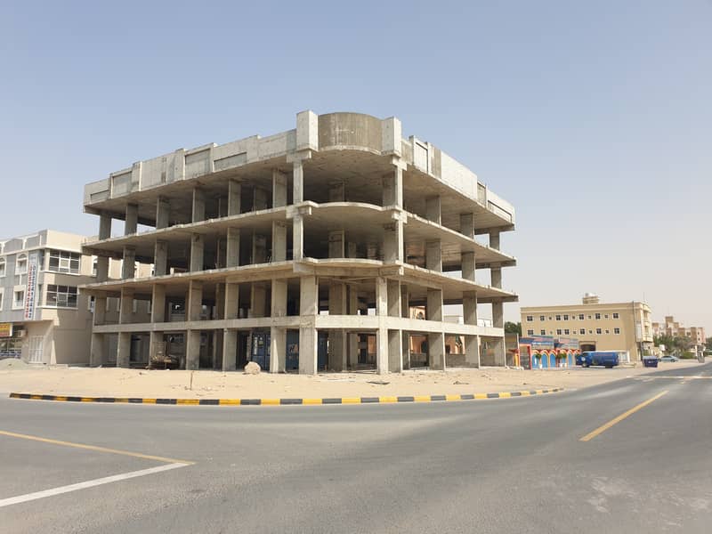 For sale unfinished building on the corner in Al Rawda area in Ajman at a snapshot price