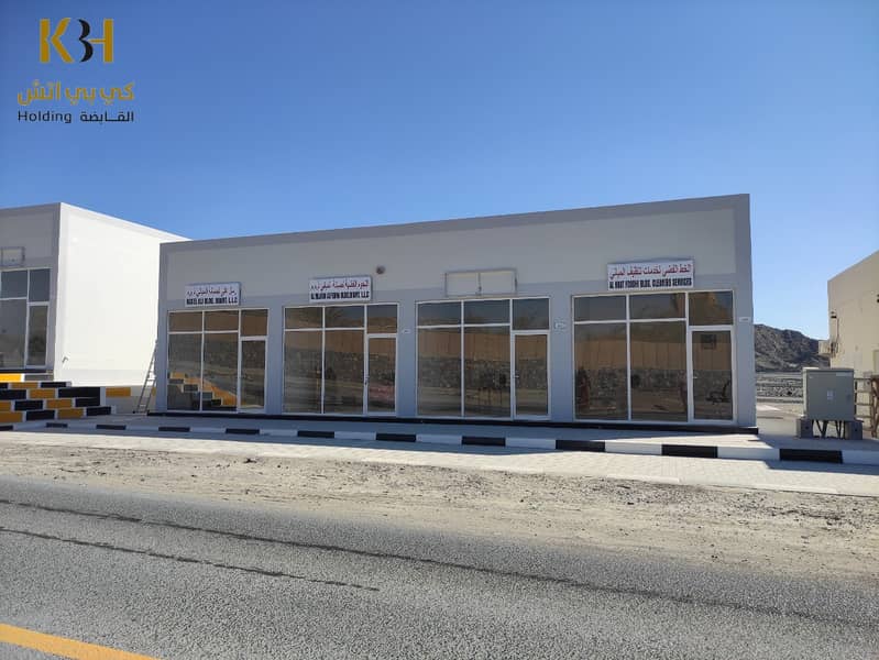 Shops building with 10% income -  Masfoot 1- Ajman