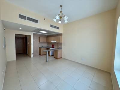 Studio for Rent in Dubai Residence Complex, Dubai - Cozy Studio with Semi-Open Kitchen | Pool & Gym | Dubai Land