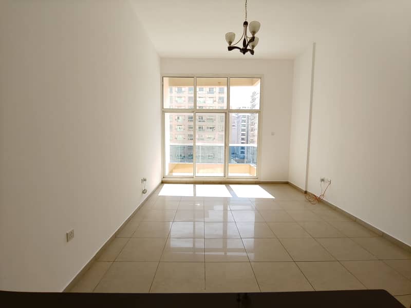 Spacious Studio Apartment with Balcony, Wardrobes,  Car Parkin, Gym, and Pool