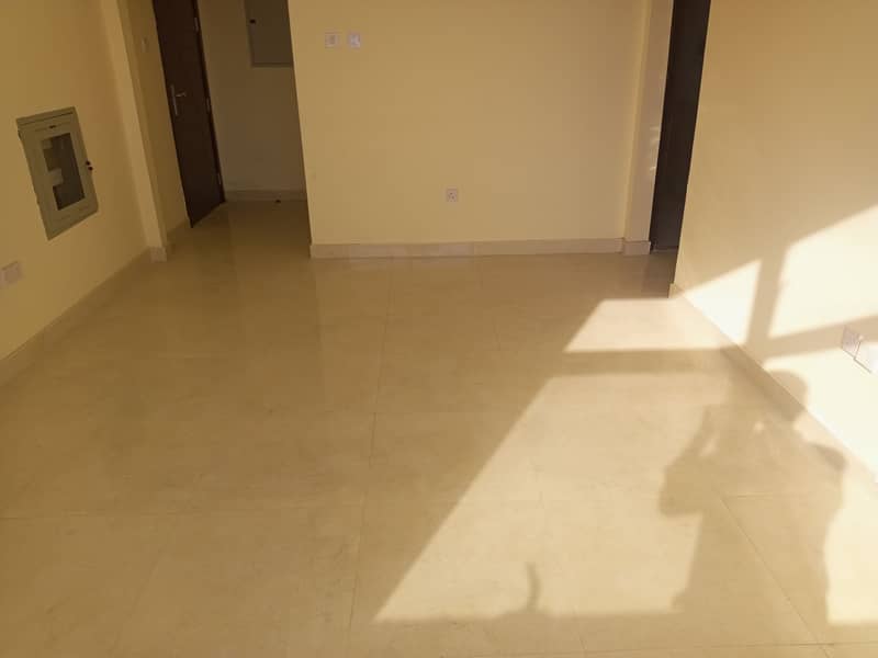 Brand New 2BHk without deposit with balcony just  28K  In HOSHI Sharjah