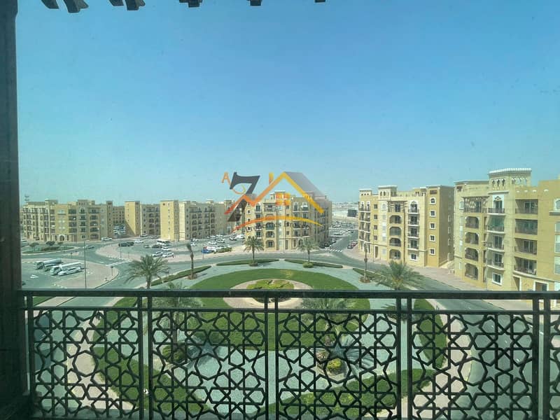 LARGE STUDIO WITH BALCONY AVAILABLE IN EMIRATES CLUSTER/INTERNATIONAL CITY/RENT ONLY 21000/-
