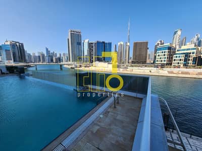 فلیٹ 2 غرفة نوم للايجار في الخليج التجاري، دبي - شقة في برج ارت XV الخليج التجاري 2 غرف 109990 درهم - 6547835