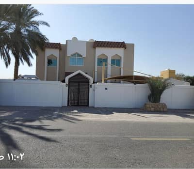 6 Bedroom Villa for Sale in Al Gharayen, Sharjah - For sale a two-storey villa in Al-Qarayen , Sharjah