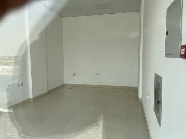 shop for rent in a new building in Al Aliah AJ 12000