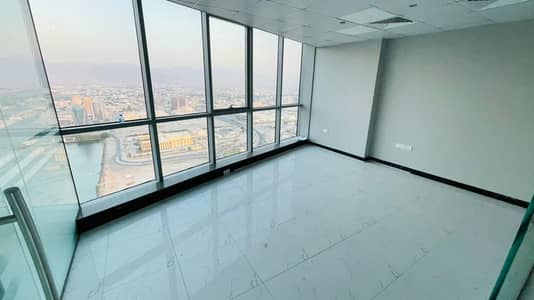 Office for Sale in Dafan Al Nakheel, Ras Al Khaimah - Glass Partitioned | Water and Mountain View
