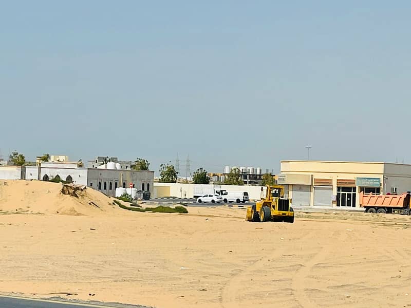 first time in ajman  industrial land available for sale