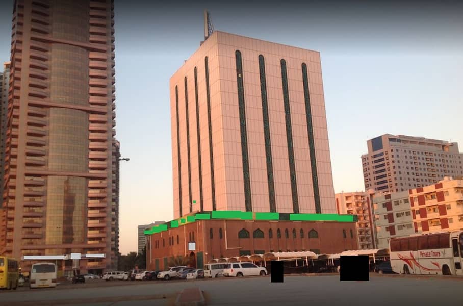 Commercial & Residential Building at Sheikh Khalifa St. For Sale  __  the Main Road  __Close to Sharjah