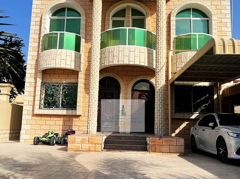 Spacious villa for sale without down payment 5 rooms, a hall, a majlis, a maid room with electricity and water in Ajman, Al Rawda 3 area, near Sheikh