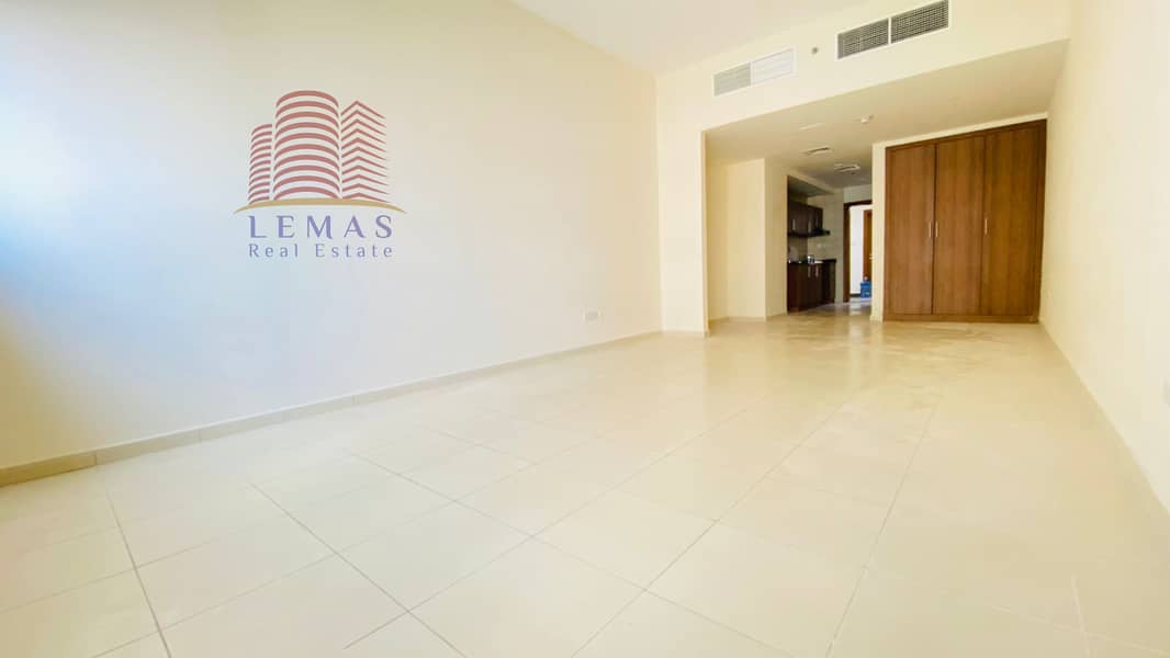 studio partial sea view front tower  for sale in Ajman one tower with parking