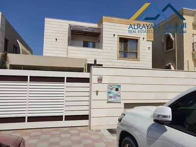 5 Bedroom Villa for Sale in Al Mowaihat, Ajman - Own a European-style villa for sale in Al Mowaihat 1 with water, electricity and air conditioners wi