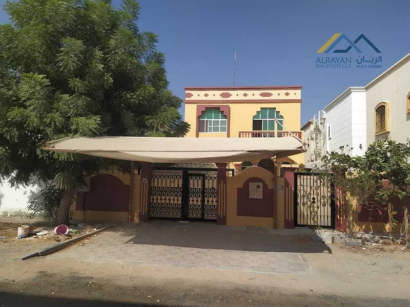 For sale, with water and electricity, a very excellent two-story villa in Ajman, Al Rawda 1