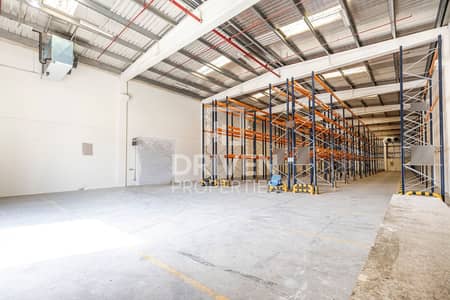 Warehouse for Rent in Dubai Industrial Park, Dubai - Temperature controlled with a Racking