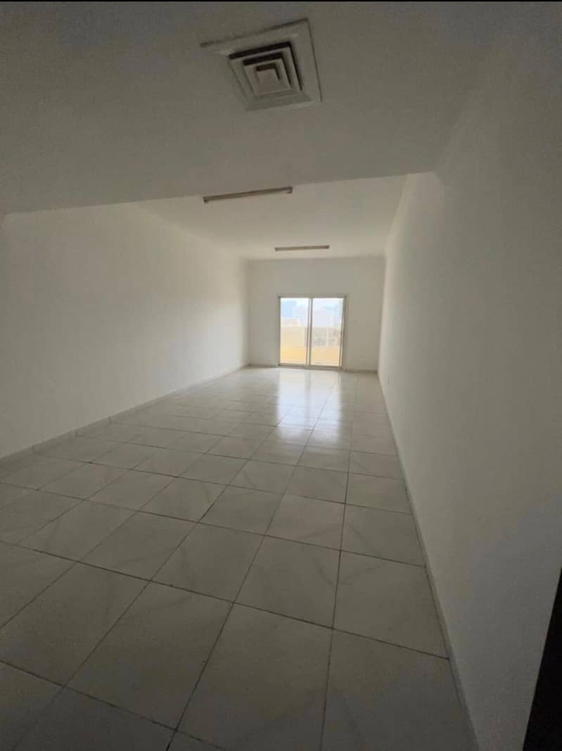 A room and a hall, 2 bathrooms, with a balcony, large areas, with two parks, inside the tower, Al Ittihad Street, opposite Abu Dhabi Commercial Point