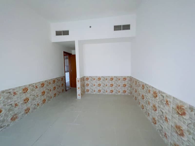 2 BHK  WITH PARKING  FOR RENT CITY VIEW IN AJMAN PERAL TOWER