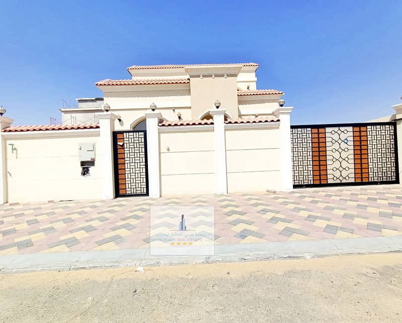 For sale, a villa with a stone facade on Mohammed Bin Zayed Street, directly, with the possibility of bank financing for a period of 25 years, without