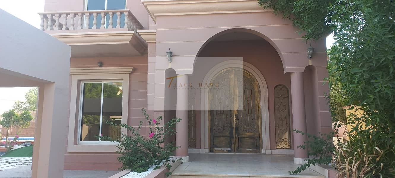 elegant villa with a swimming pool in Mohammed bin Zayed City