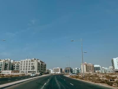 Mixed Use Land for Sale in Al Warsan, Dubai - Warsan 4 | On Main Street | G+7 Plot | For Sale