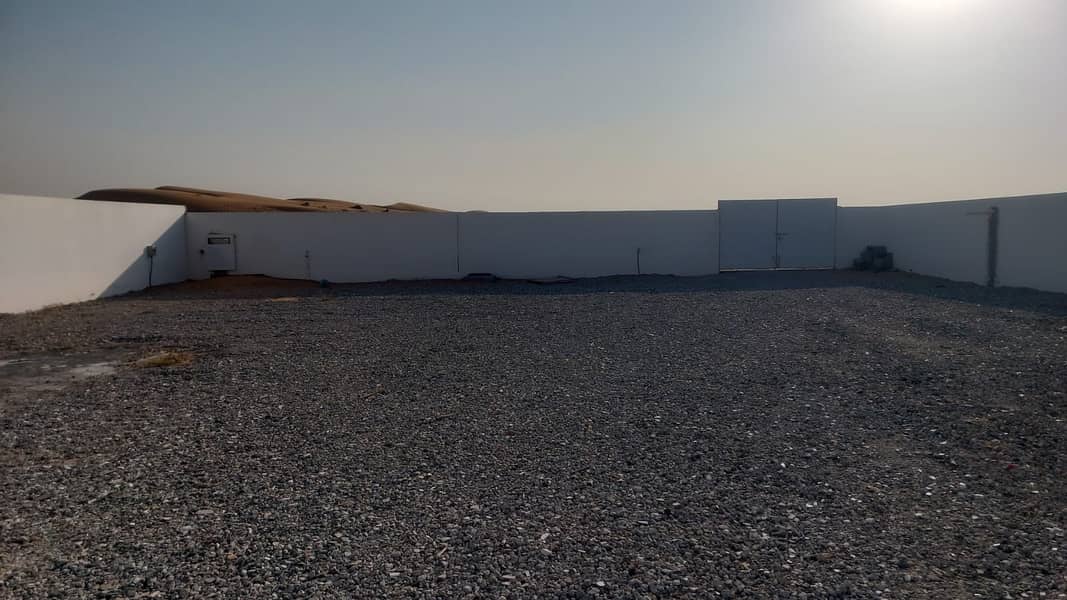 Open plot 10,000 sq. ft. AED. 45,000/-