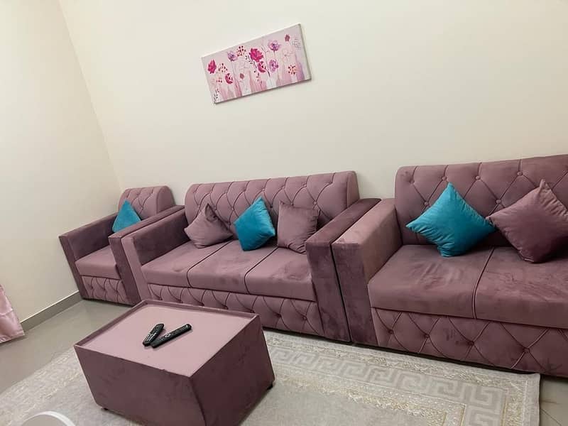For rent a furnished apartment in Sharjah, Al-Taawun, consisting of two rooms and a hall, for 4600, including internet only