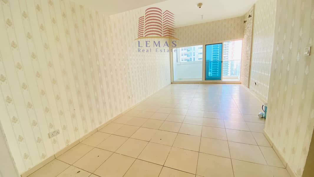 2 bhk empty close kitchen with parking for sale in Ajman one tower