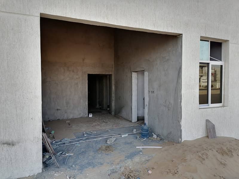 For sale a commercial building in Al Zahia, Ajman, on the main street