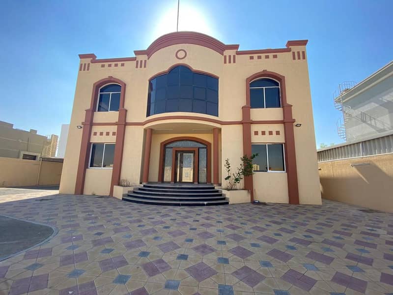 Super Lux villa two floors for rent in Al Raqaib \ special location near the mosque  With air conditioners