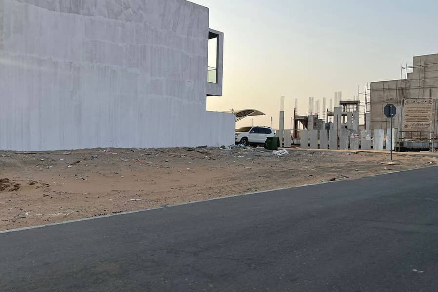 Five plots in Al Zahia, on Al Qar Street directly