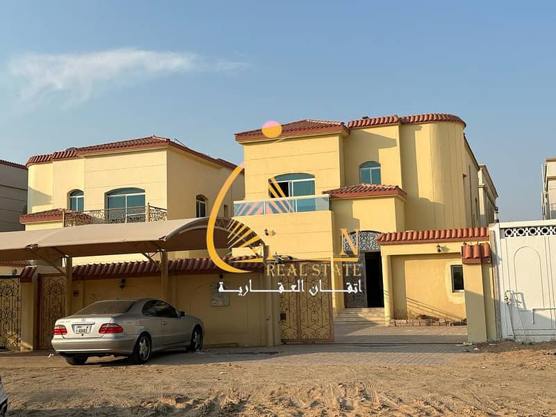 Villa for sale in Ajman, Al Mowaihat, at a special price, an area of ​​4500feet, an excellent location, a special price