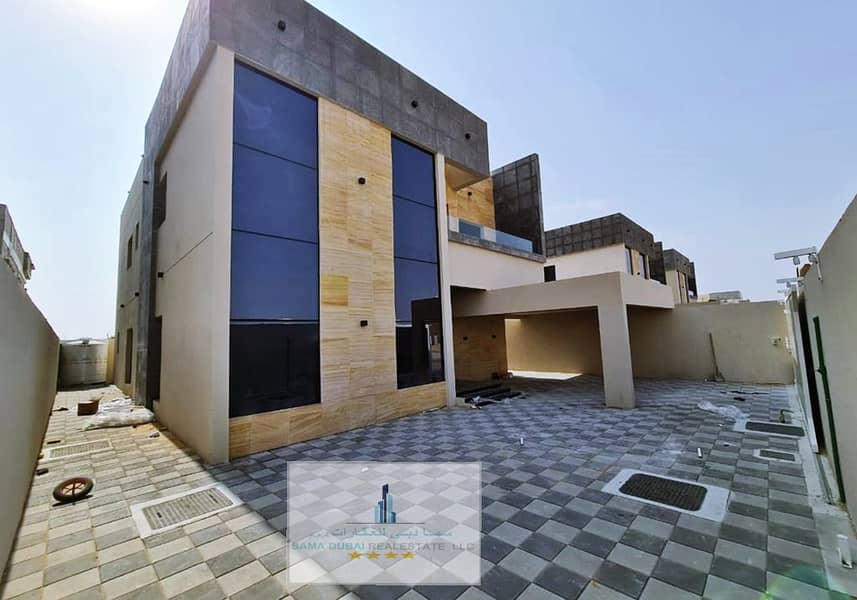 Villa for sale, including registration fees from the owner, without down payment, 100% full bank financing, directly on Sheikh Mohammed bin Zayed Stre
