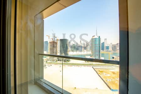 فلیٹ 2 غرفة نوم للايجار في الخليج التجاري، دبي - شقة في برج الخليج التنفيذي أ الخليج التجاري 2 غرف 120000 درهم - 6609937