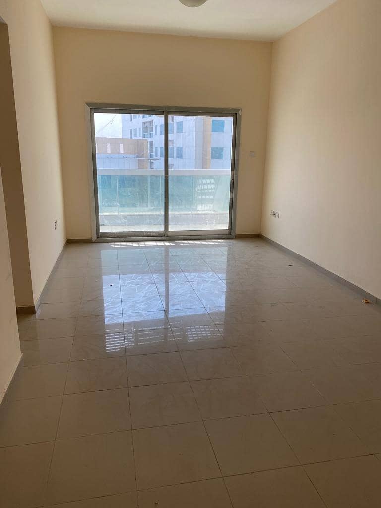 For sale, two rooms and a hall in Ajman Pearl Towers, area 1312 square feet, with parking