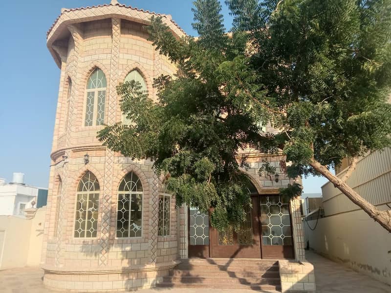 For sale a stone villa on the street corner with electricity and air conditioners in Al Rawda 2